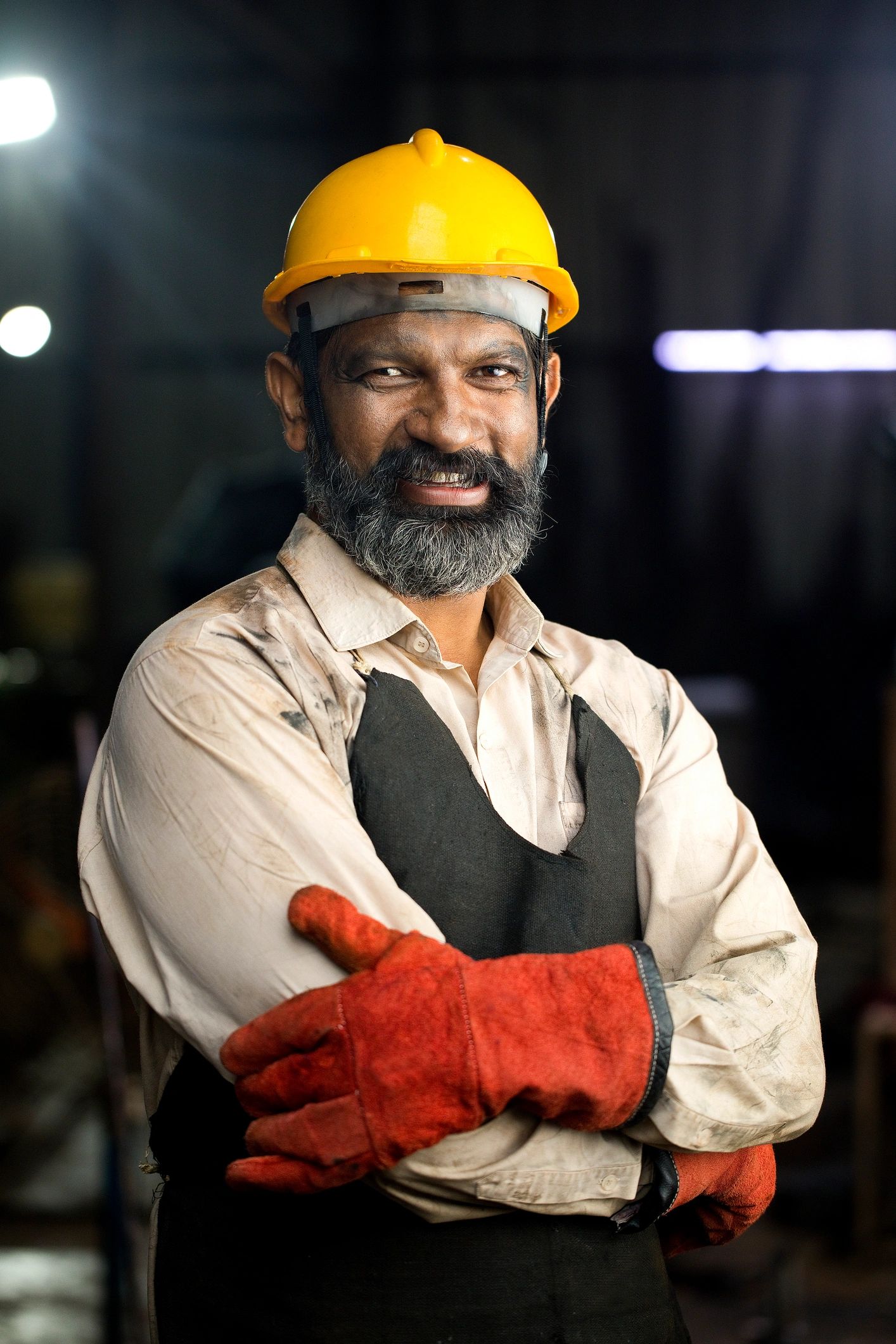 Industrial worker in protective workwear at a factory